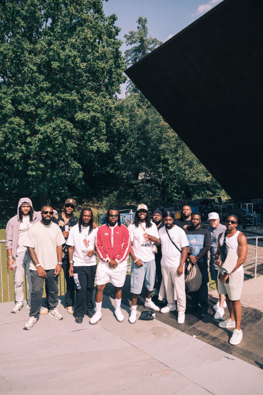 Group portrait beside the Big Smoke stage.