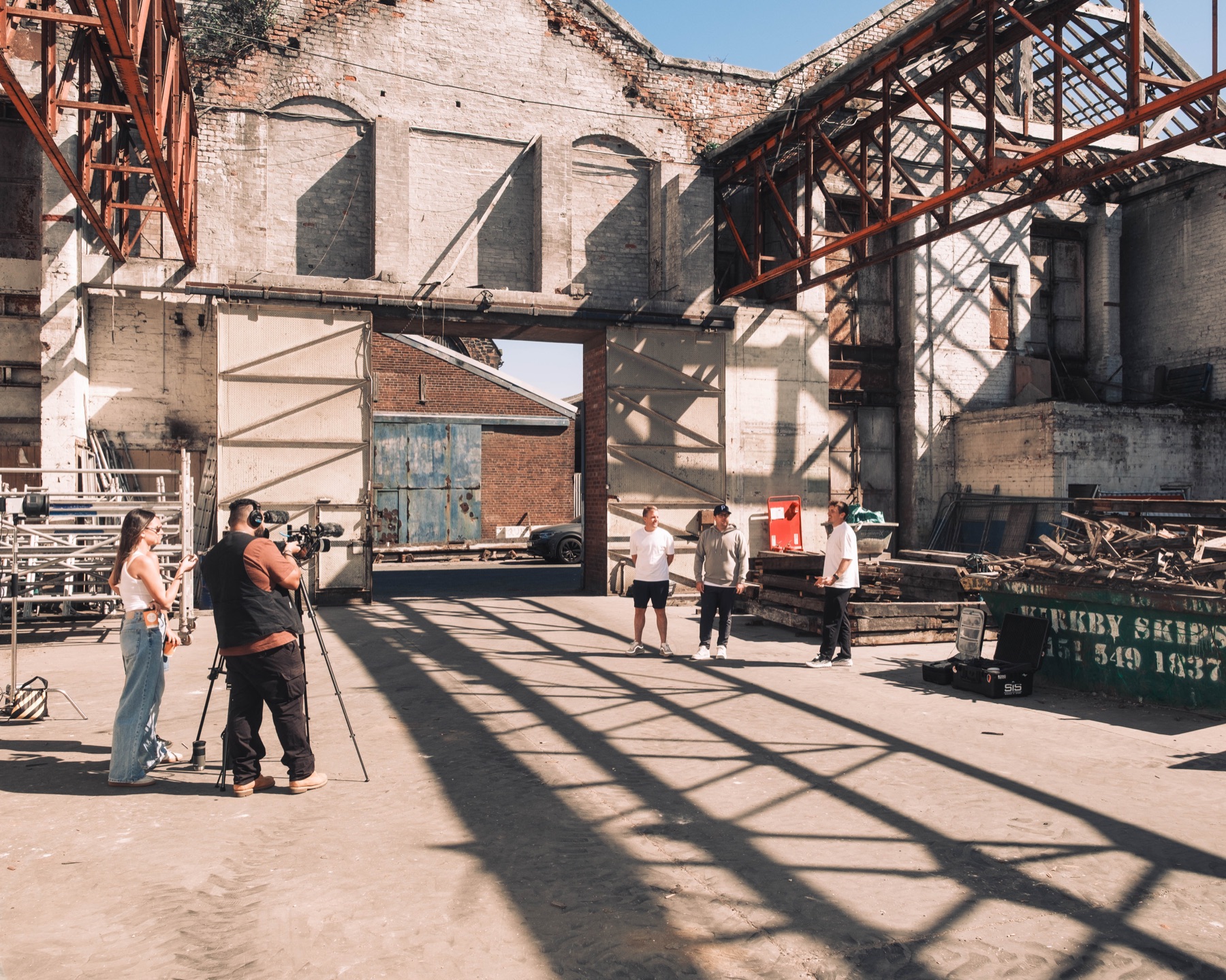 Club Mona founders surveying the open industrial space
