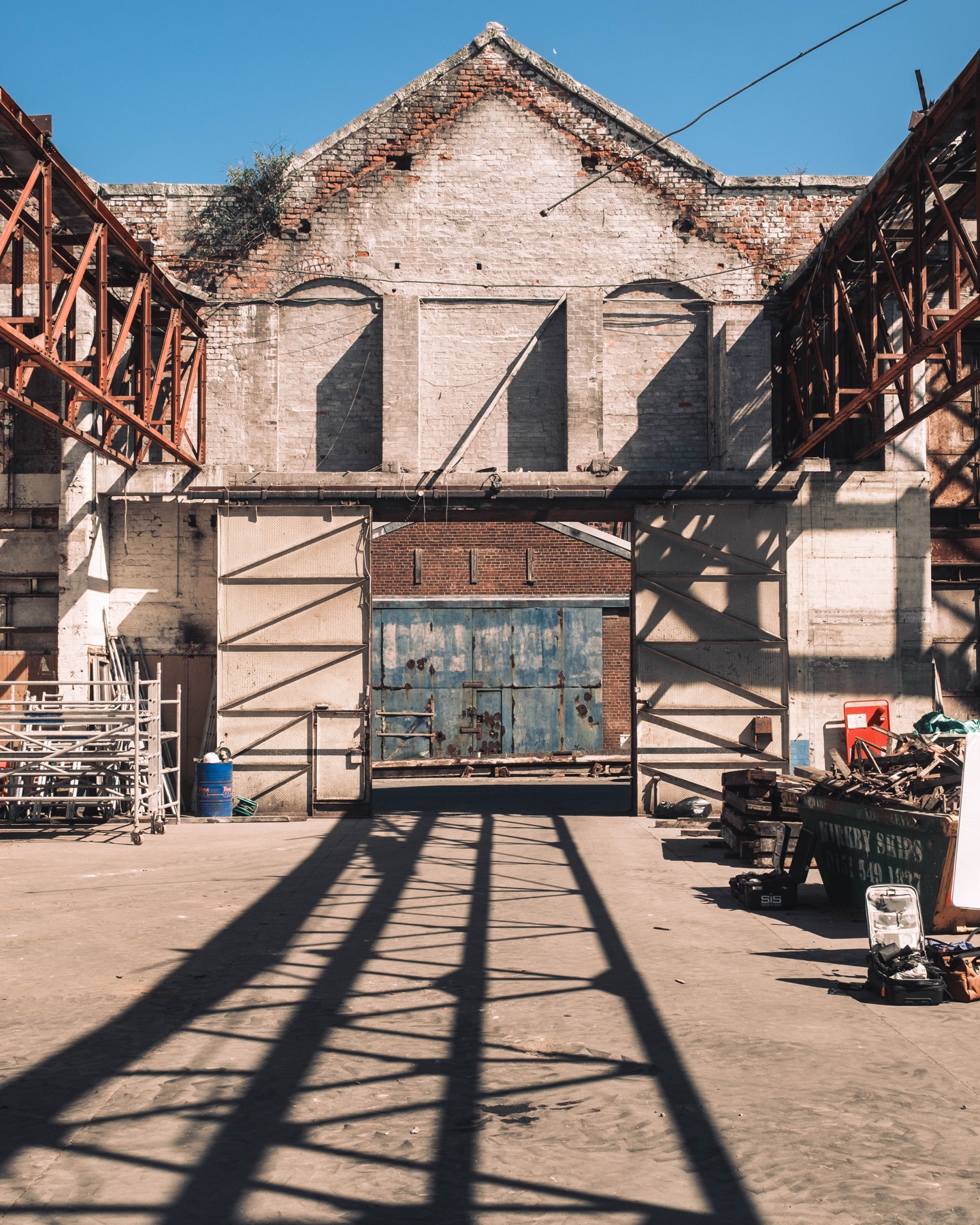 Sunlight and steel shadows across the future Club Mona space