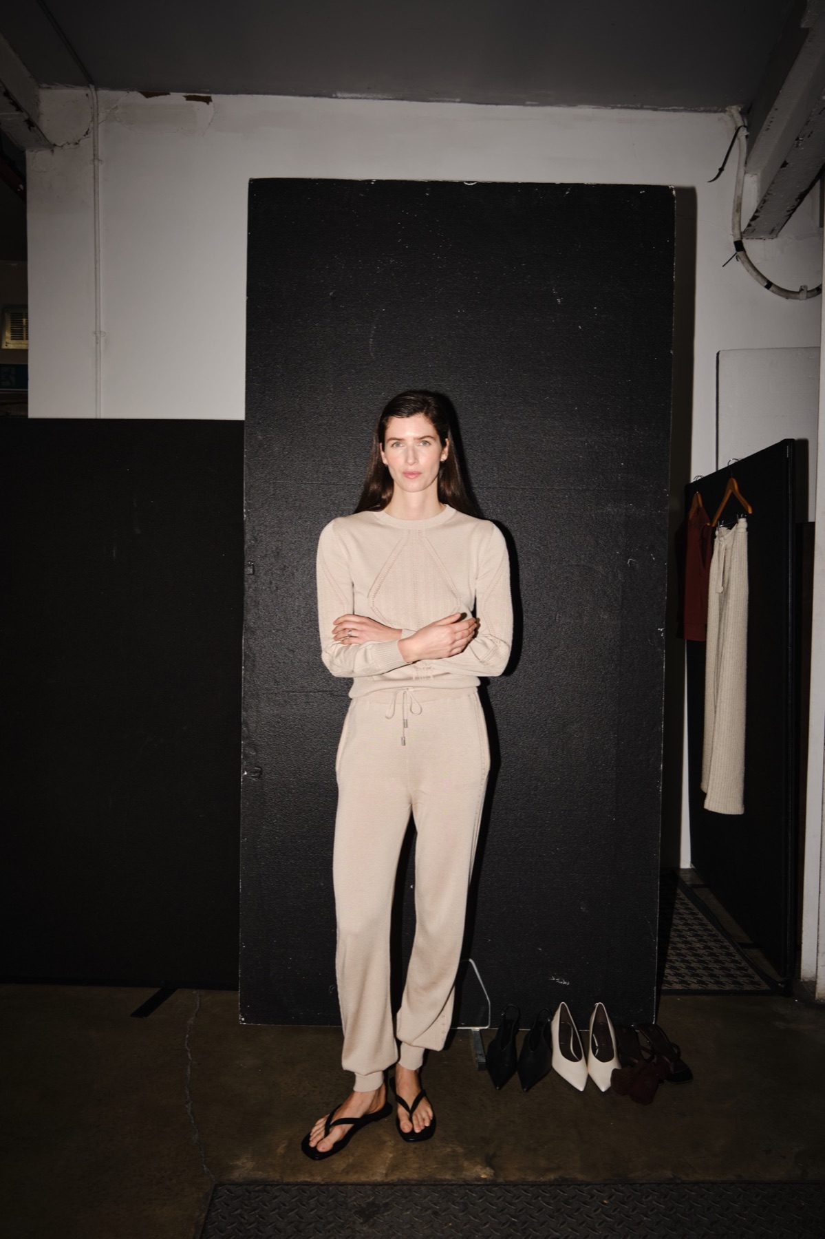 Emello SS26 model photographed between campaign takes