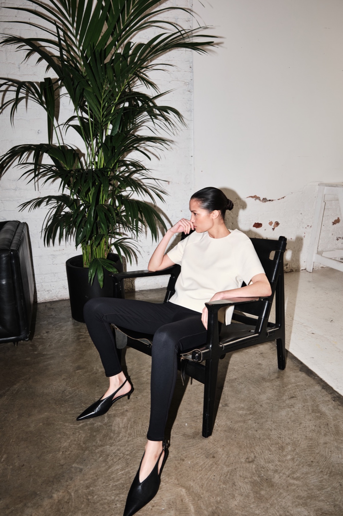 Emello SS26 campaign set and model between takes