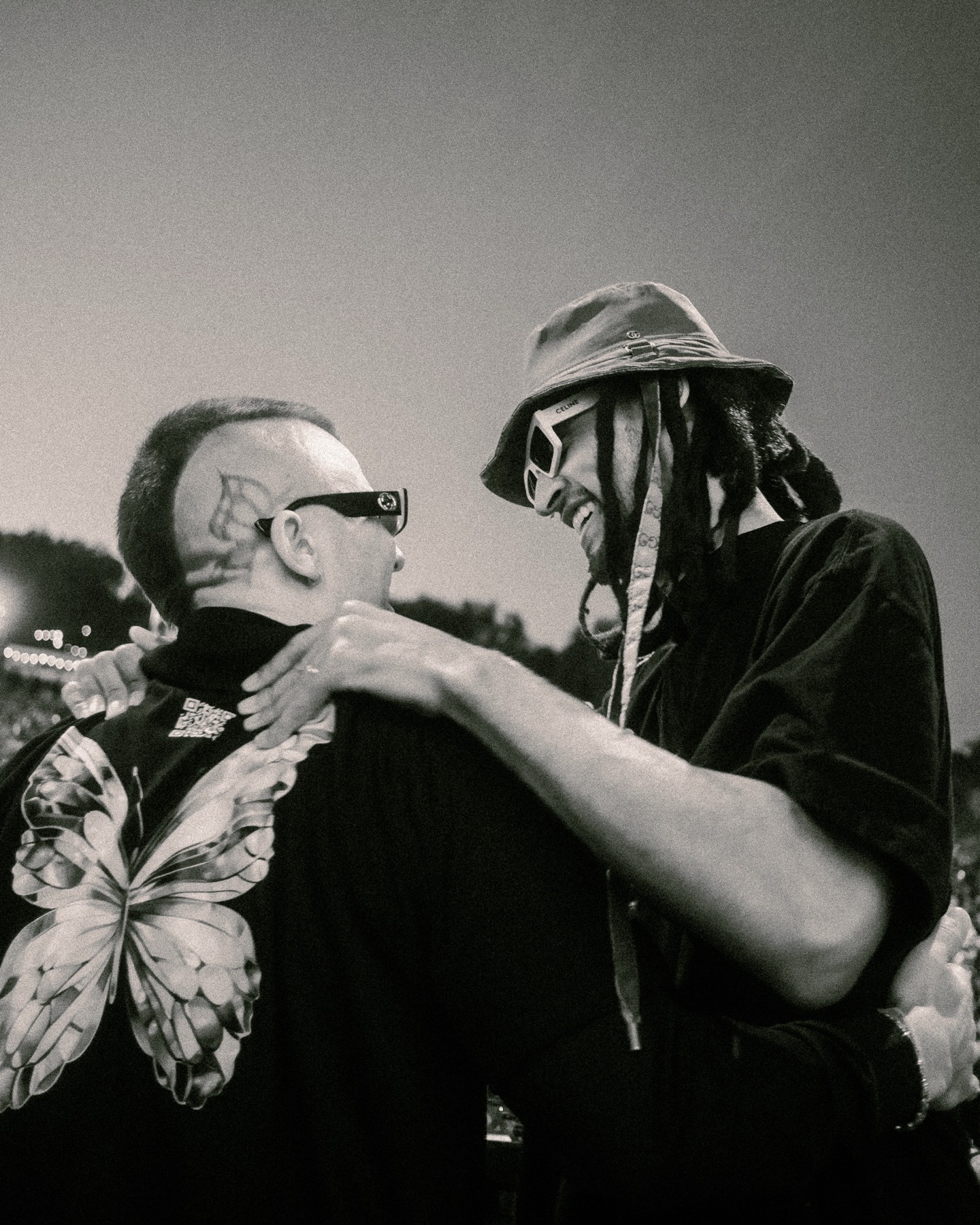 Two artists sharing a moment onstage at One Life.