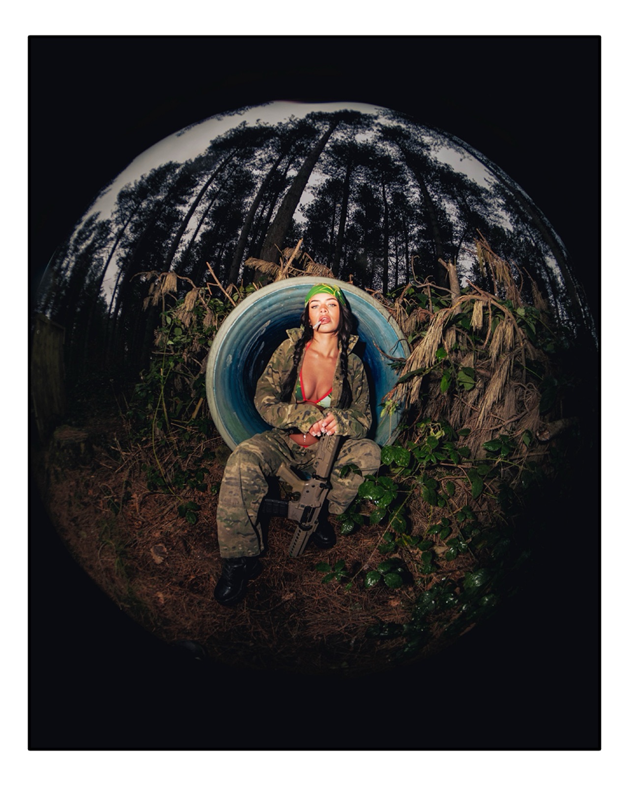 OYE woodland fashion portrait framed through a circular lens.