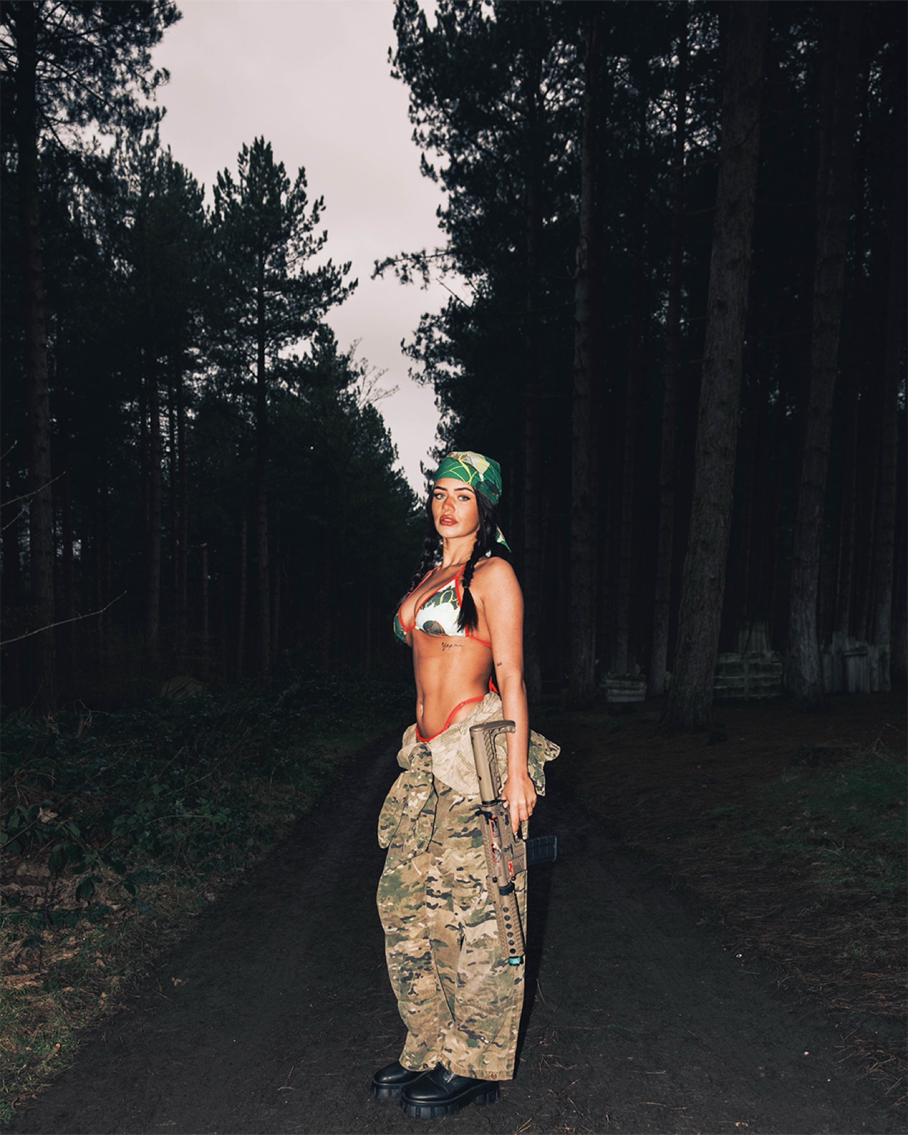 OYE portrait showing the model from head to toe on the woodland path.