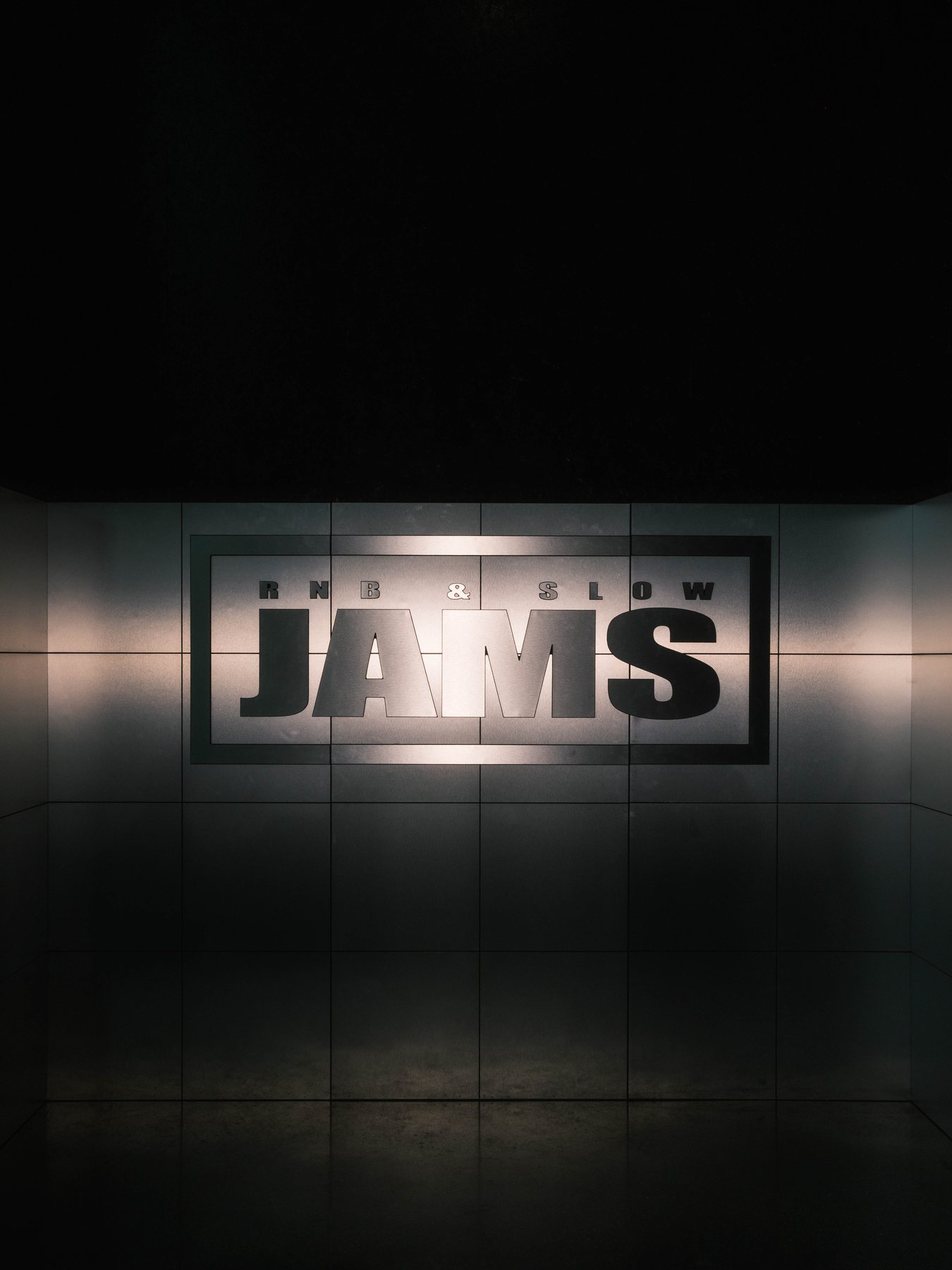 R&B Slow Jams signage glowing inside Magazine London